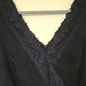 Vintage black sheath dress with lace neckline